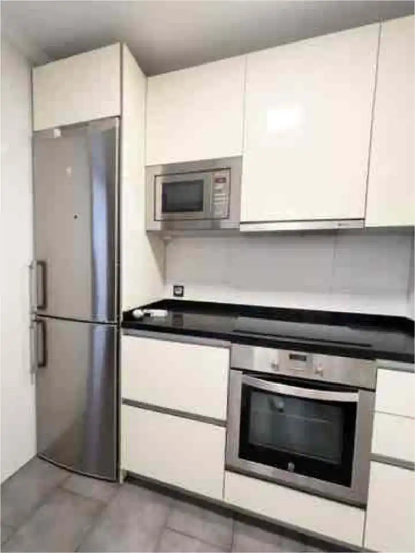 Apartamento en venta en Puerta Blanca Cocina de Apartamento en venta en Málaga con Terraza y Piscina