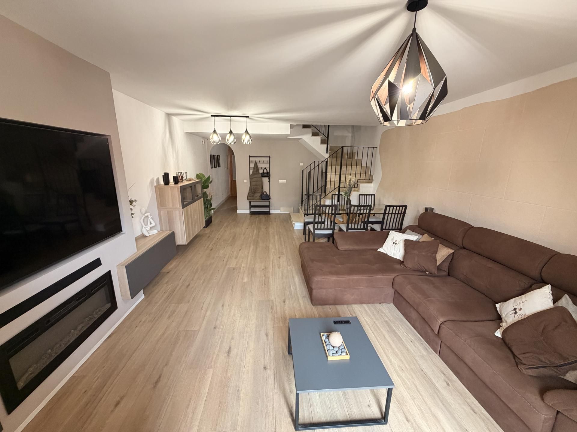 Sala d'estar de Casa adosada en venda en Marratxí amb Jardí privat, Terrassa i Aparcament comunitari