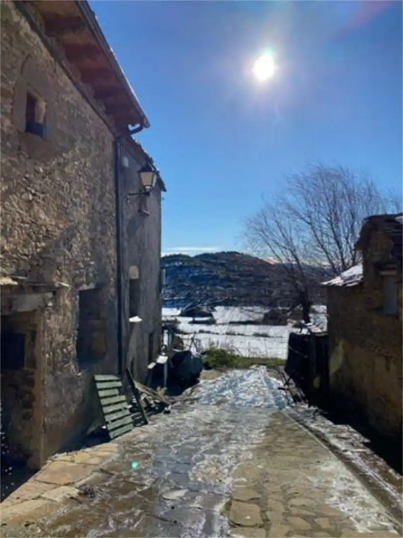 Einfamilien-Reihenhaus zum Verkauf in Universidad Außenansicht von Einfamilien-Reihenhaus zum Verkauf in Jaca mit Privatgarten und Terrasse