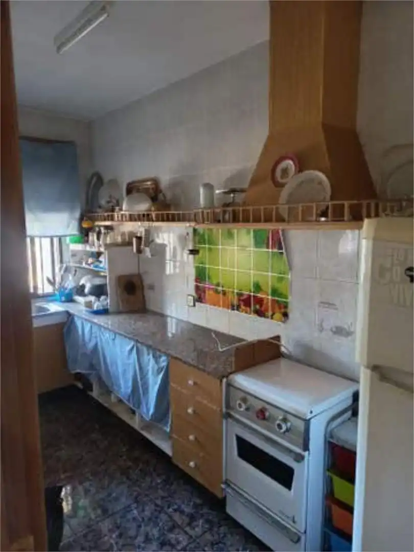 Küche von Einfamilien-Reihenhaus zum Verkauf in Trujillo mit Privatgarten, Abstellraum und Schwimmbad
