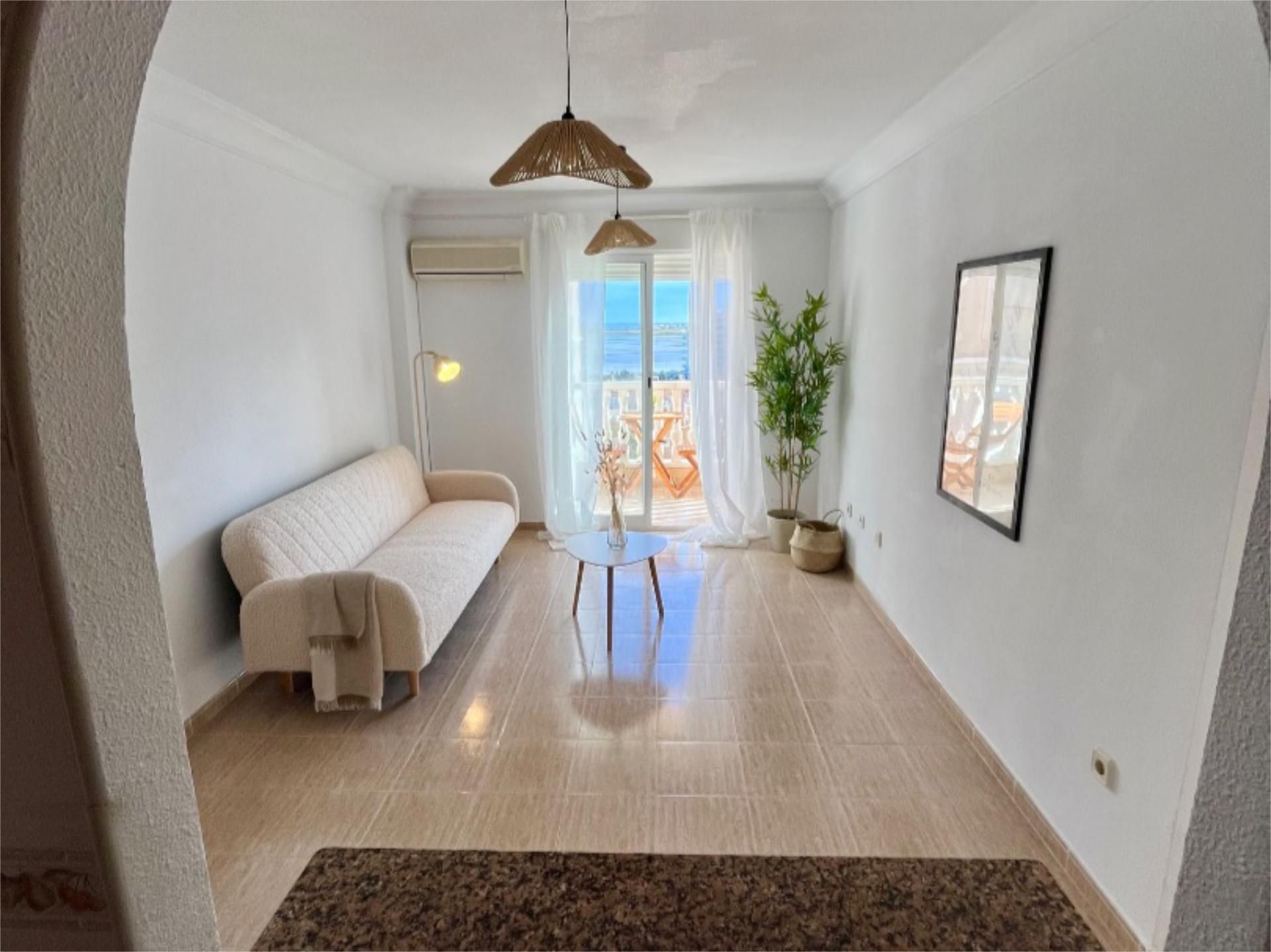 Sala de estar de Piso en venta en Cartagena con Aire acondicionado, Piscina y Amueblado