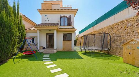 Foto 2 von Einfamilien-Reihenhaus zum Verkauf in Avinguda Balcon de Ponoig, 8, Polop, Alicante