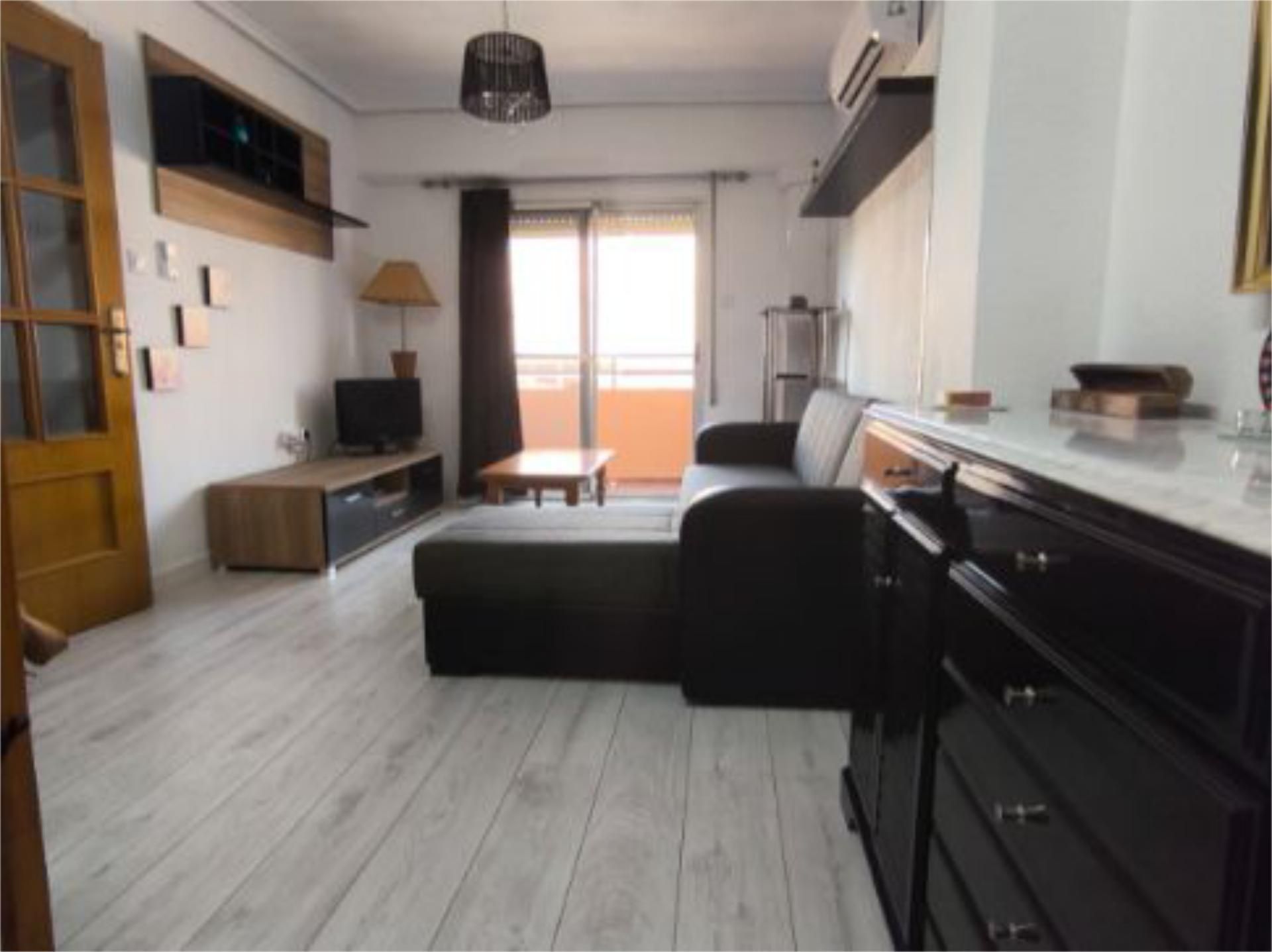 Flat for sale in Camí de Montcada, 112, Torrefiel Living room of Flat for sale in Valencia Capital with Air Conditioner and Balcony