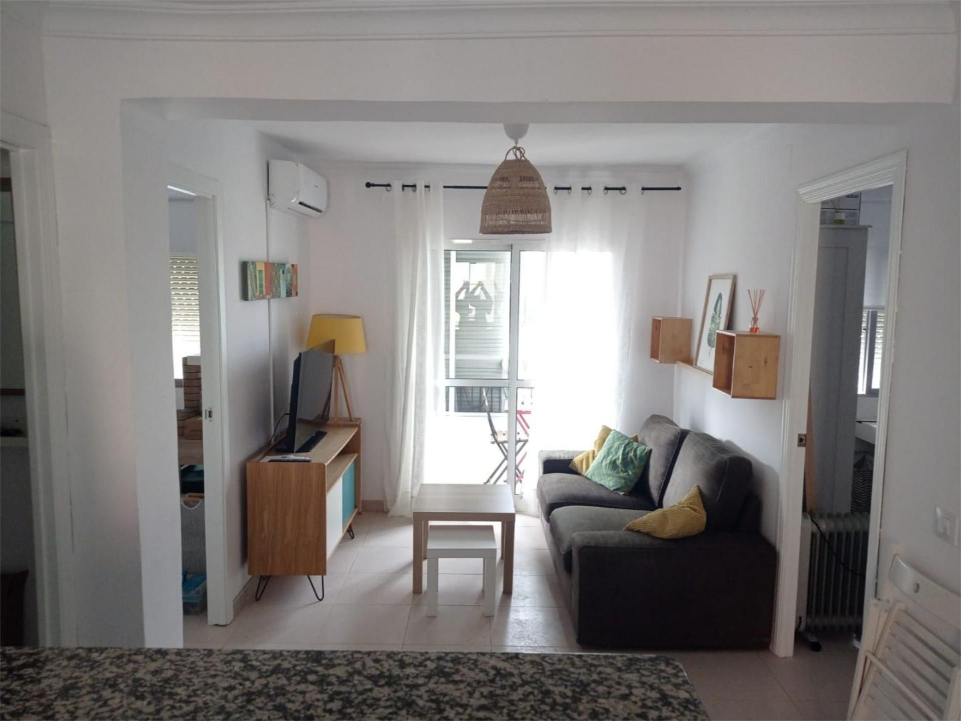 Flat for share in Calle Riquelme Quirós, 9, Amate Living room of Flat for share in Sevilla Capital with Air Conditioner, Terrace and Furnished
