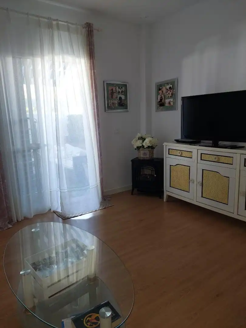 Living room of Apartments for sale in Chiclana de la Frontera  with Heating, Private garden and Parquet flooring