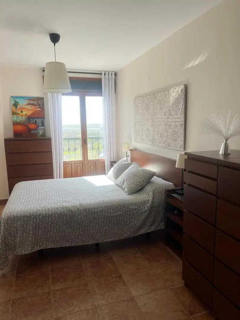 Wohnung zur Miete in Urbanización Puente Esuri, Costa Esuri Schlafzimmer von Wohnung zur Miete in Ayamonte mit Klimaanlage, Privatgarten und Terrasse