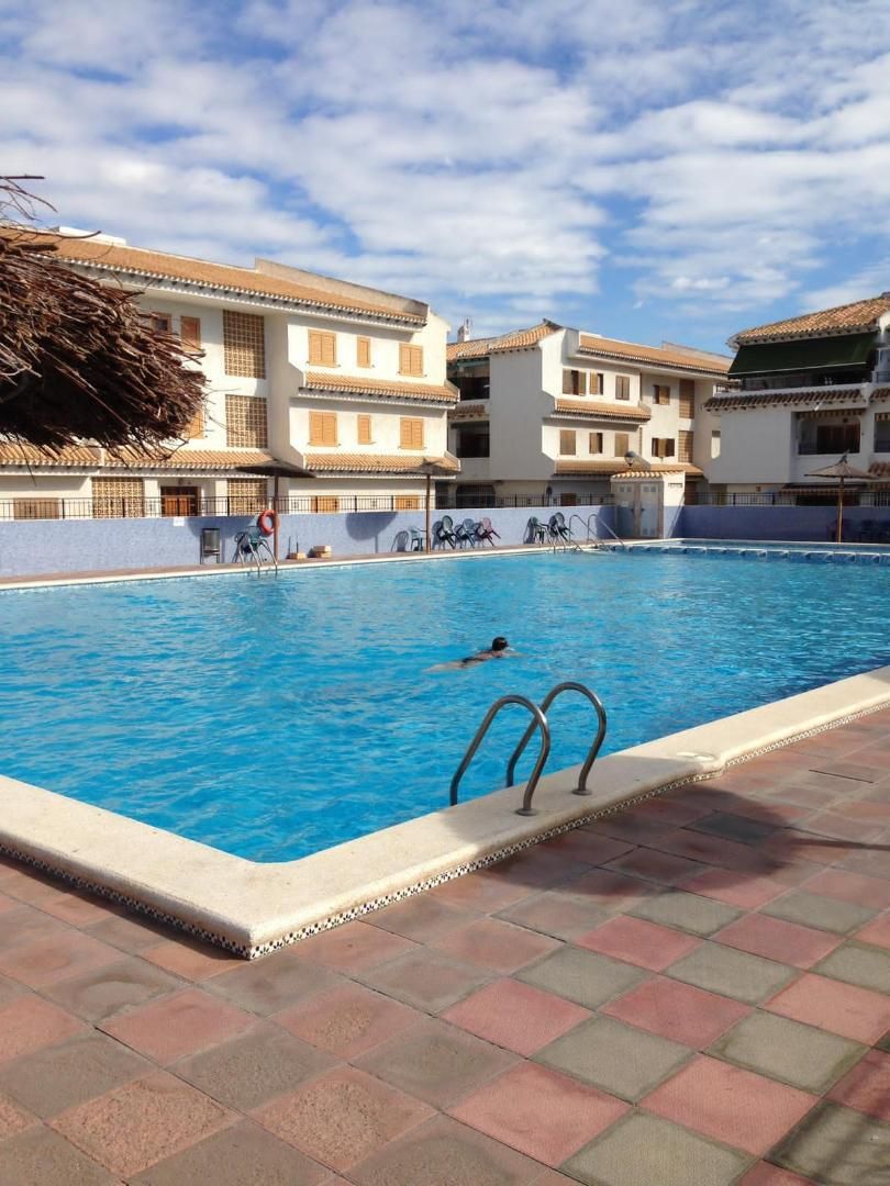 Piso de alquiler en Calle Alcoy, 31, Playa Tamarit - Playa Lissa Piscina de Piso de alquiler en Santa Pola con Jardín privado, Terraza y Piscina