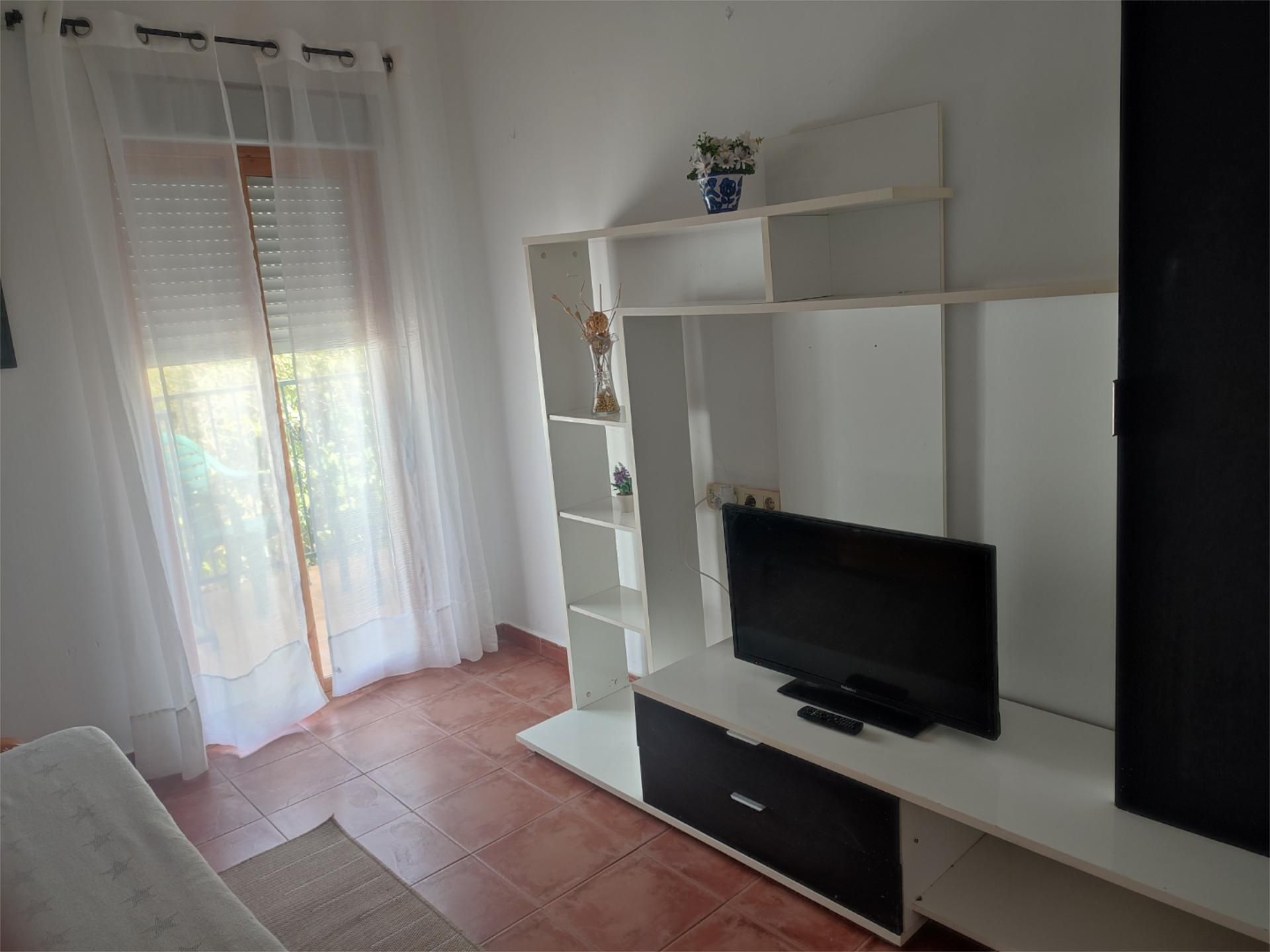 Sala d'estar de Pis de lloguer en Almuñécar amb Aire condicionat, Terrassa i Moblat