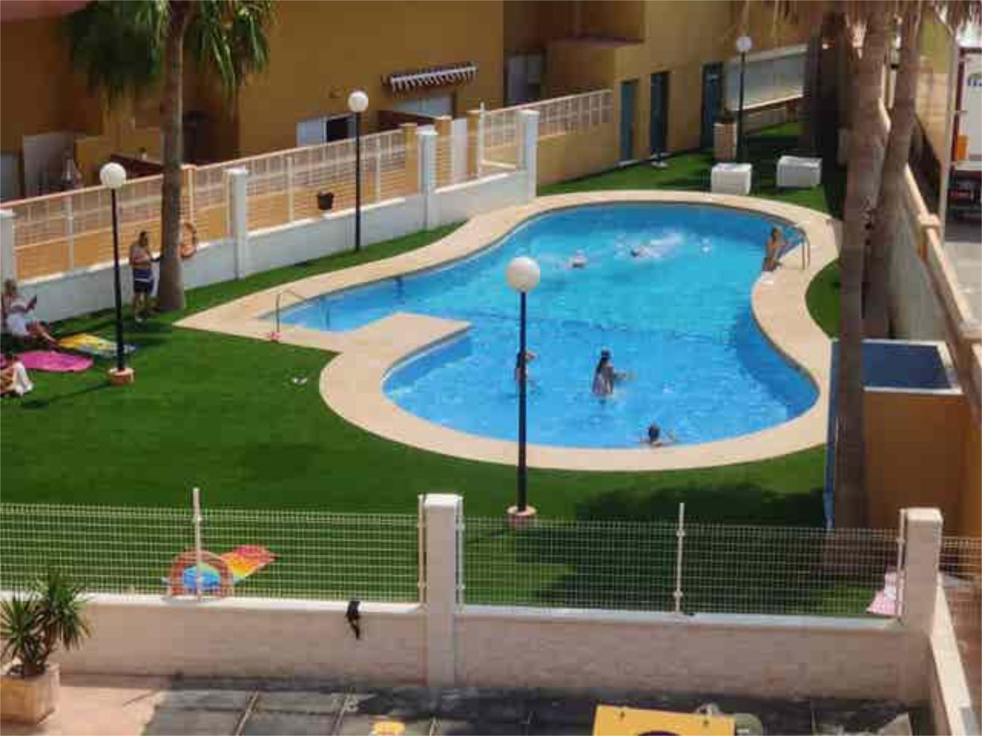 Swimming pool of Flat for rent in Roquetas de Mar  with Private garden, Terrace and Swimming Pool