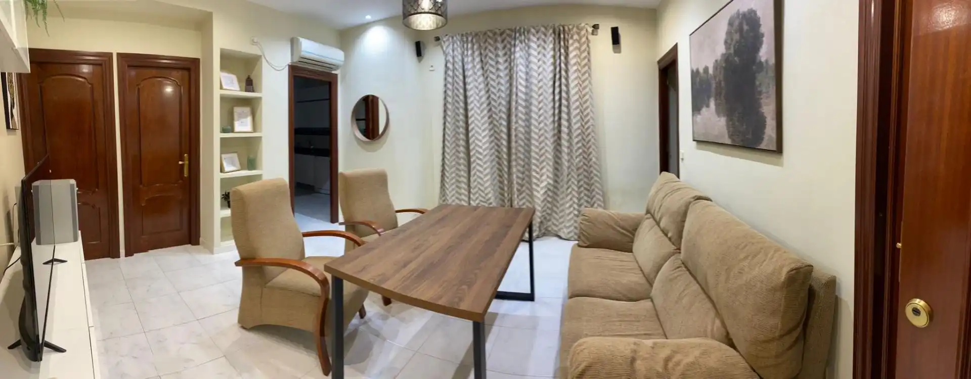 Sala d'estar de Pis de lloguer en  Sevilla Capital amb Aire condicionat, Calefacció i Moblat