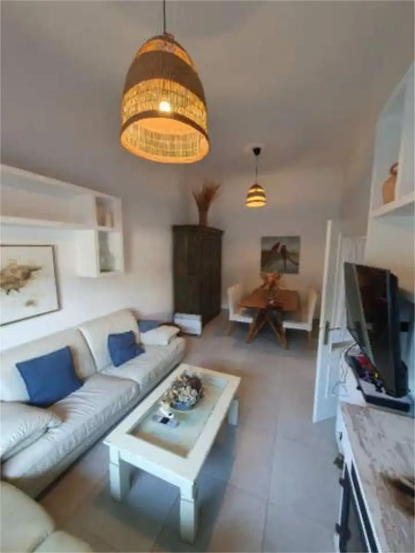 Sala d'estar de Casa o xalet en venda en Tomares amb Piscina