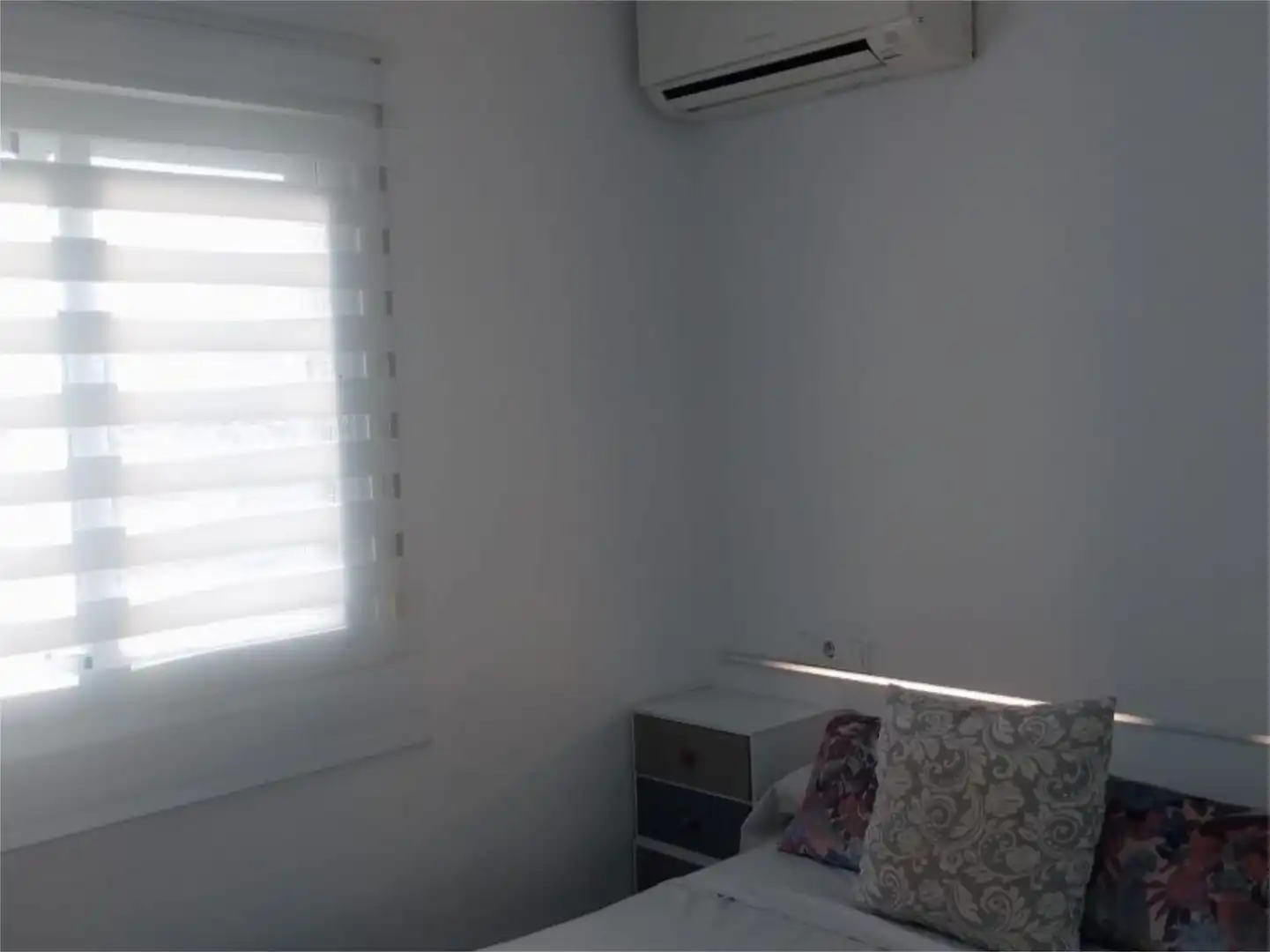 Dormitori de Apartament de lloguer en Úbeda amb Aire condicionat, Calefacció i Moblat