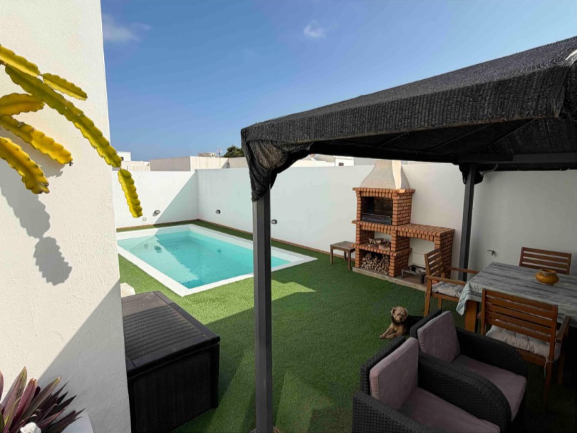 Houses for sale in Tahiche Swimming pool of Houses for sale in Teguise with Air Conditioner, Heating and Private garden