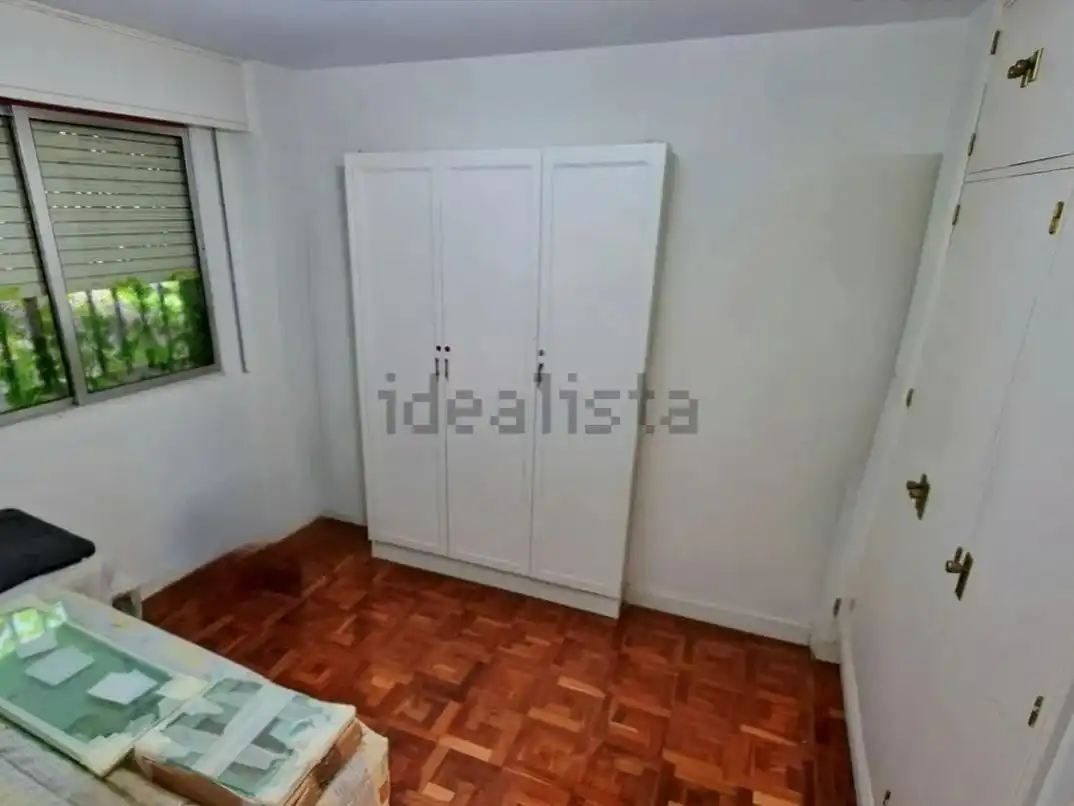 Pis en venda a Calle Isla Malaita, 9, Peñagrande Dormitori de Pis en venda en Madrid amb Calefacció, Jardí privat i Parquet
