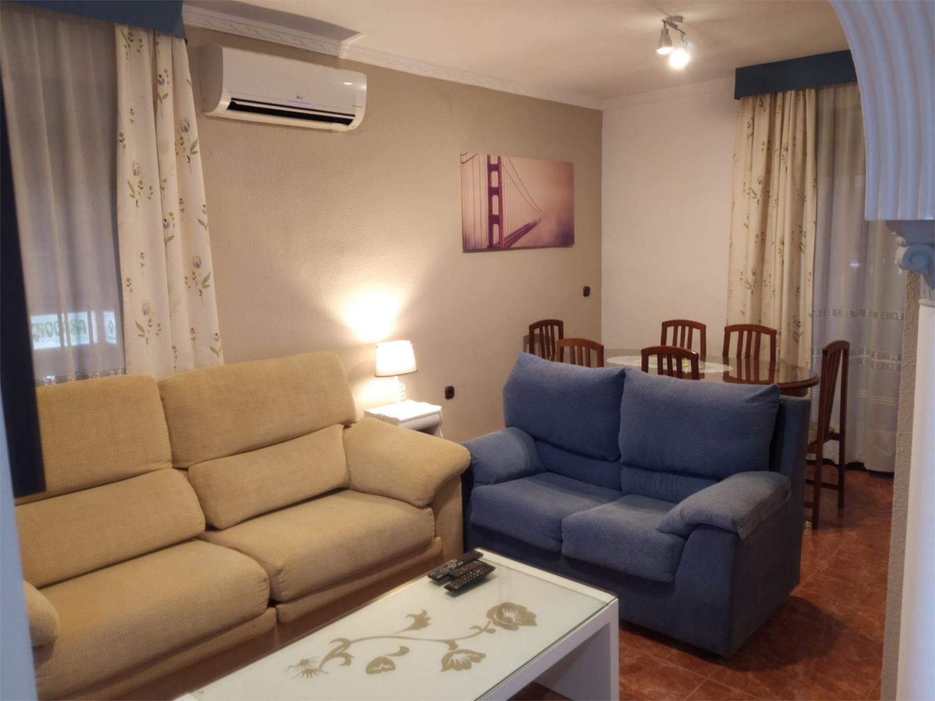 Living room of Flat for sale in  Granada Capital  with Air Conditioner, Furnished and Balcony