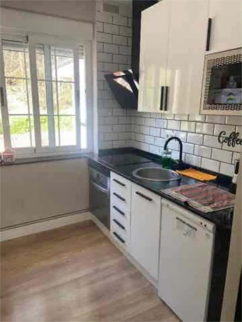 Küche von Wohnung zum Verkauf in Castrillón mit Heizung, Privatgarten und Terrasse