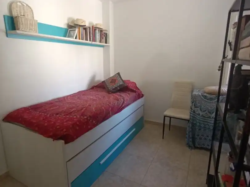 Room in Avinguda Sant Joan de Déu, 82, Calafell Platja Bedroom of Flat for share in Calafell with Air Conditioner, Terrace and Furnished