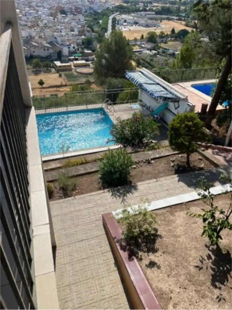 Piscina de Apartamento de alquiler en Torredonjimeno con Jardín privado
