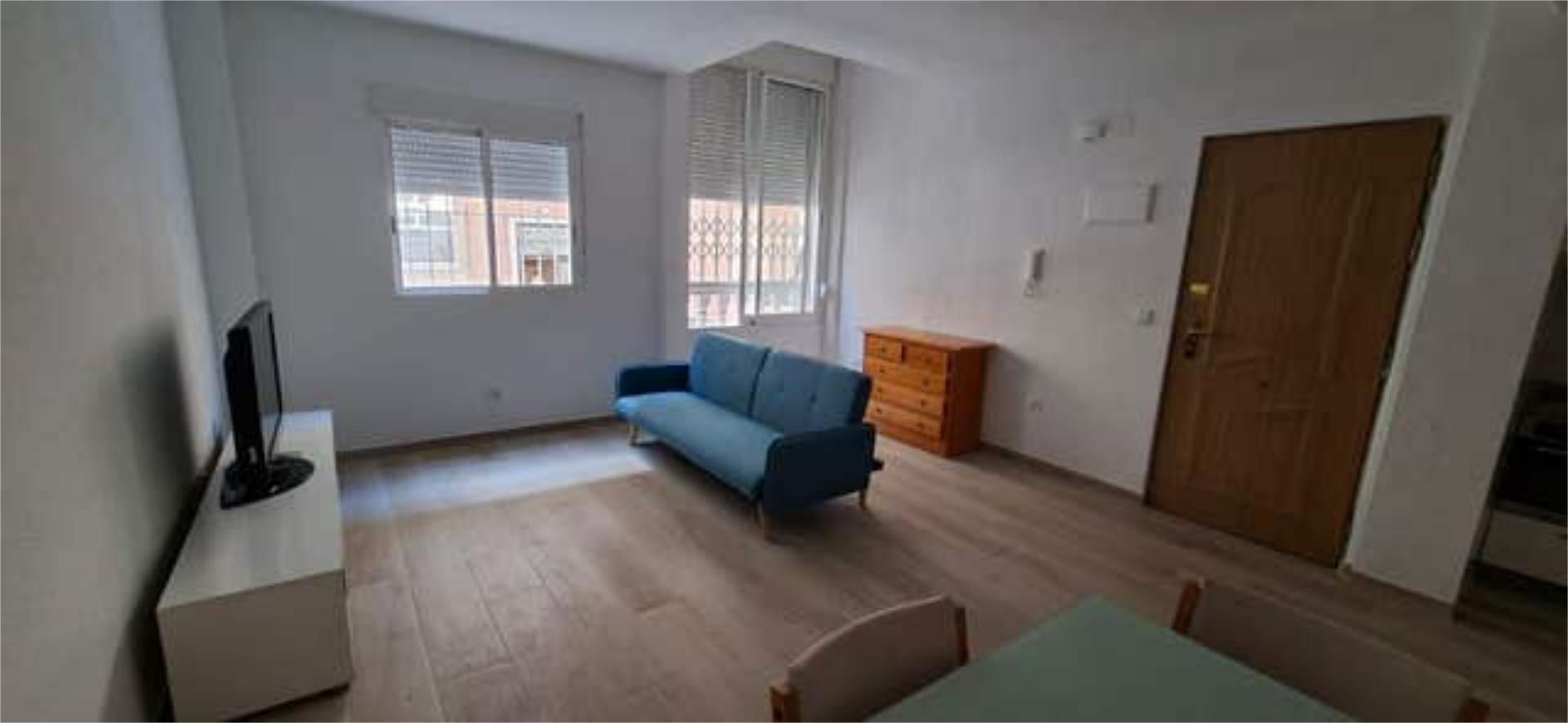 Dormitori de Apartament de lloguer en Torrevieja amb Jardí privat, Piscina i Moblat