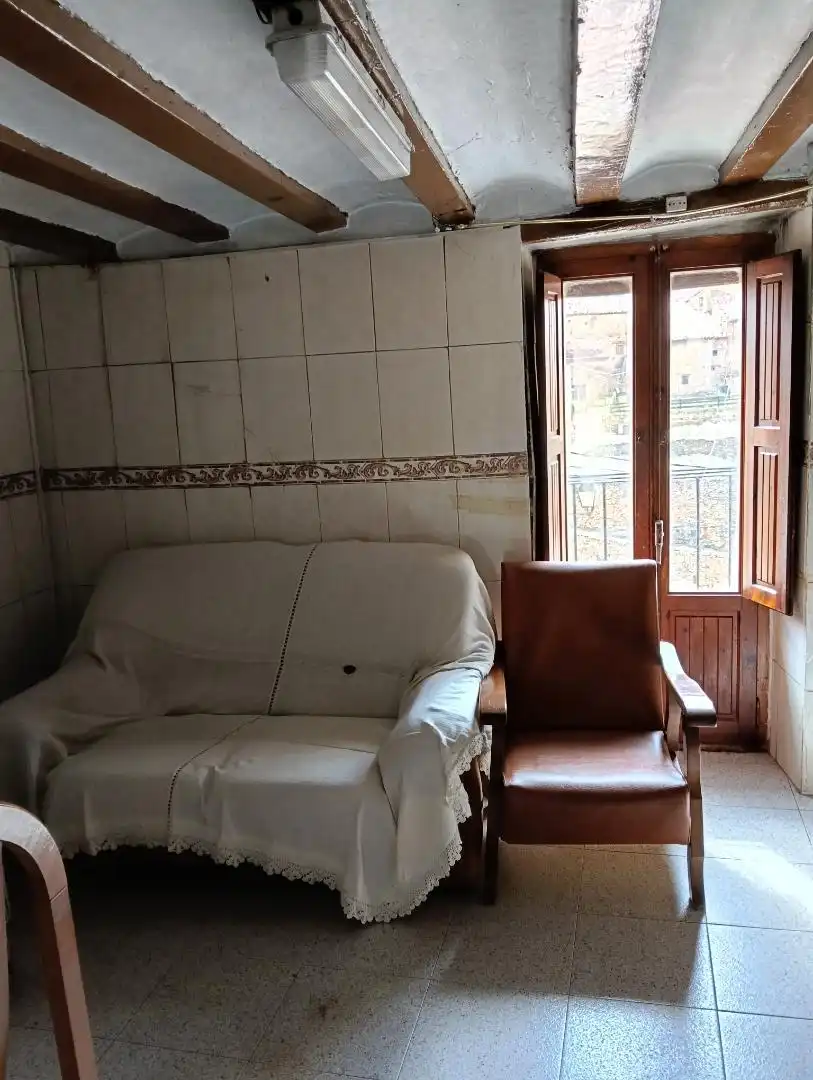 Sala de estar de Casa adosada en venta en La Iglesuela del Cid