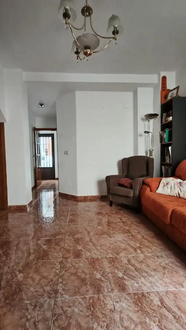 Wohnzimmer von Einfamilien-Reihenhaus zum Verkauf in Molvízar mit Klimaanlage und Terrasse
