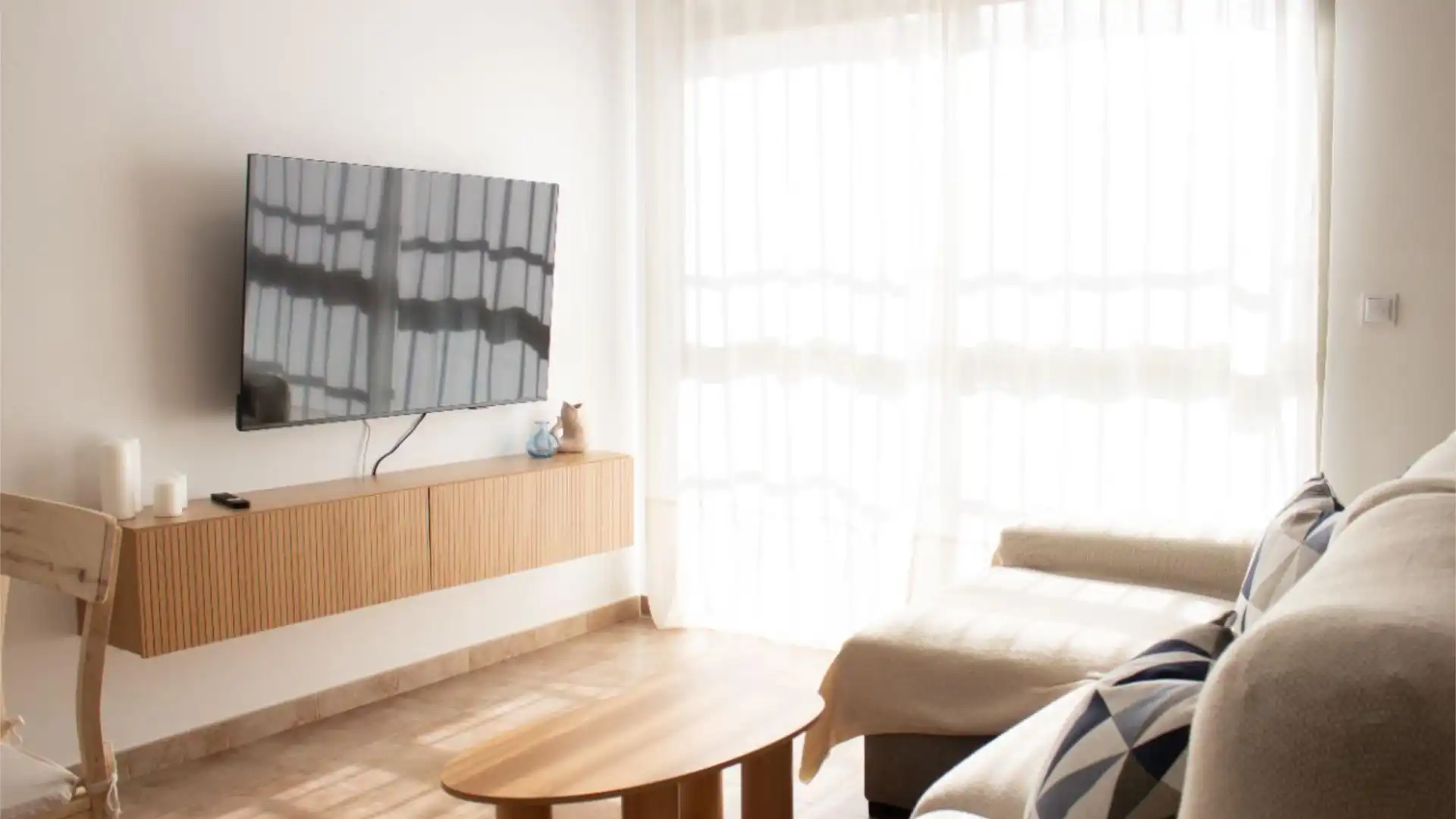 Sala d'estar de Casa adosada de lloguer en Pilar de la Horadada amb Aire condicionat, Calefacció i Jardí privat