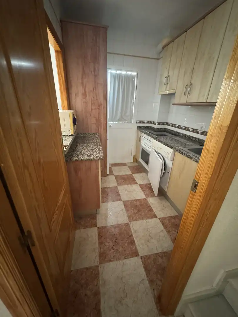 Küche von Einfamilien-Reihenhaus zum Verkauf in La Antilla mit Privatgarten, Parkett und Terrasse