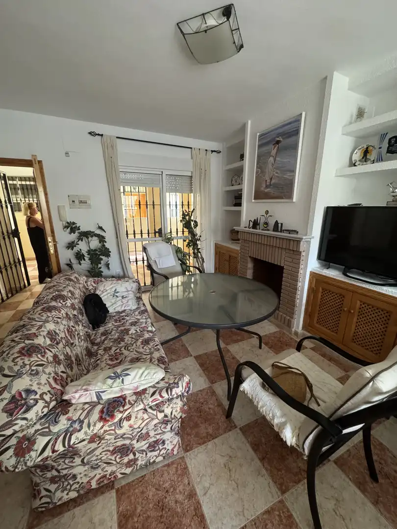 Wohnzimmer von Einfamilien-Reihenhaus zum Verkauf in La Antilla mit Privatgarten, Parkett und Terrasse