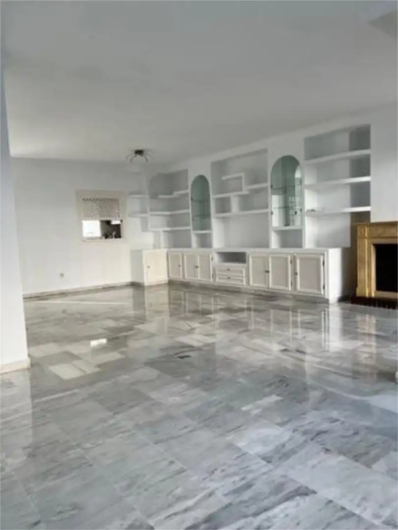 Casa adosada de alquiler en Torreblanca del Sol Sala de estar de Casa adosada de alquiler en Fuengirola con Jardín privado, Terraza y Piscina