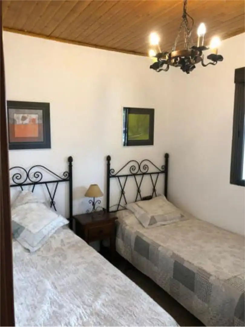 Casa adosada en venta en Oromana Habitación de Casa adosada en venta en Alcalá de Guadaira con Jardín privado, Terraza y Trastero