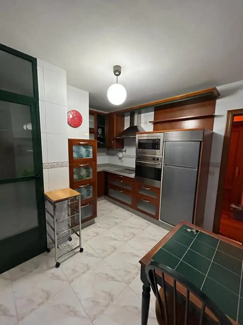 Cocina de Dúplex en venta en Padrón con Calefacción, Parquet y Trastero