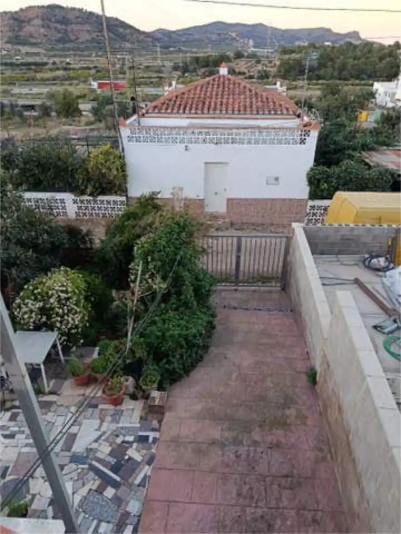 Einfamilien-Reihenhaus zum Verkauf in Centro - El Castillo Garten von Einfamilien-Reihenhaus zum Verkauf in Sagunto / Sagunt mit Privatgarten, Terrasse und Schwimmbad