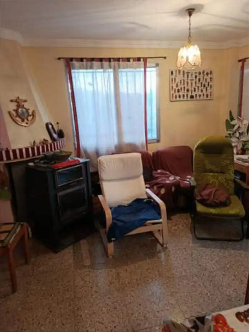 Einfamilien-Reihenhaus zum Verkauf in Centro - El Castillo Wohnzimmer von Einfamilien-Reihenhaus zum Verkauf in Sagunto / Sagunt mit Privatgarten, Terrasse und Schwimmbad