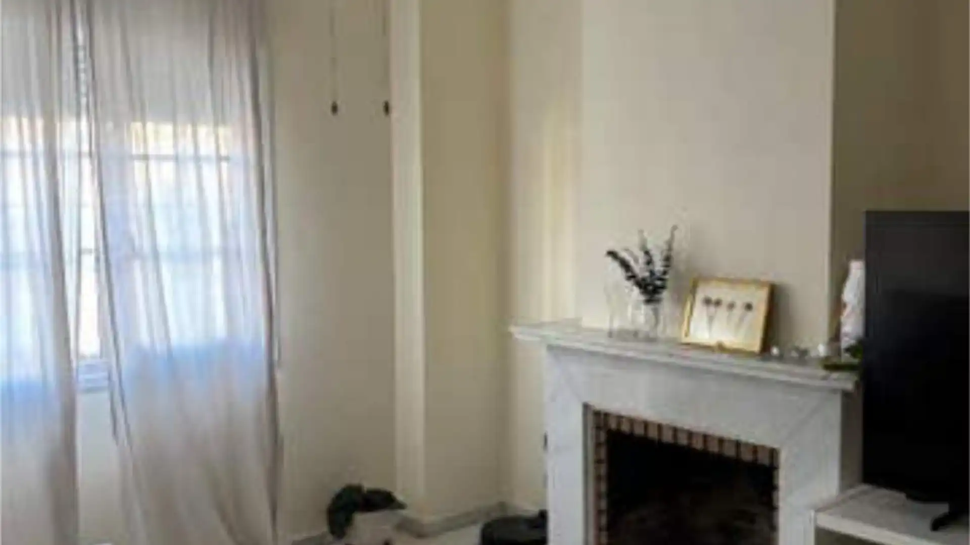 Casa adosada en venta en Consolación Sala de estar de Casa adosada en venta en Utrera con Jardín privado