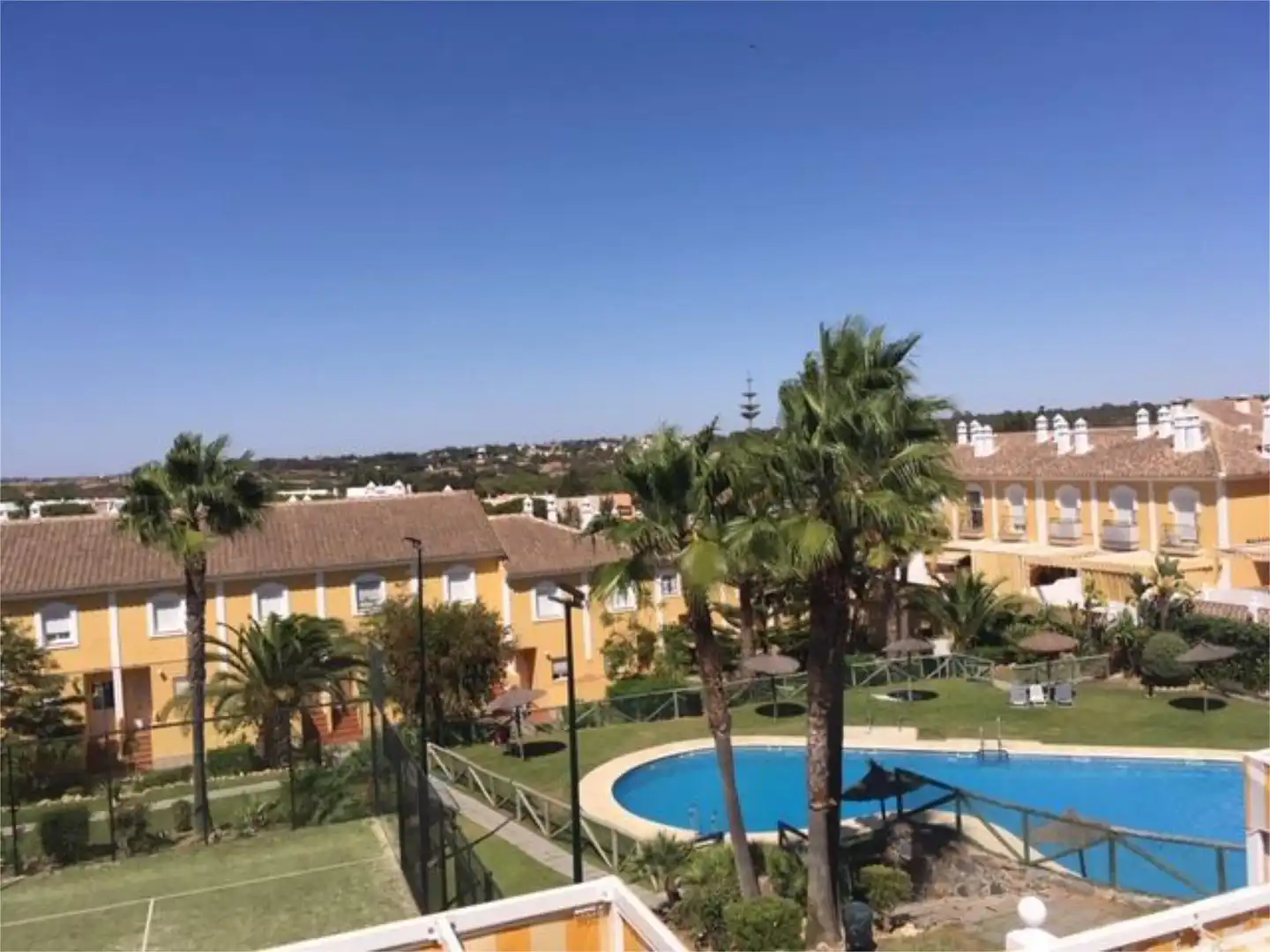 Exterior view of Single-family semi-detached for sale in Islantilla  with Air Conditioner, Terrace and Swimming Pool