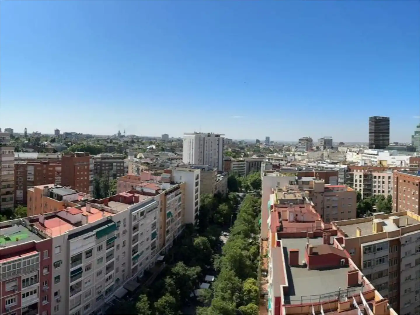 Exterior view of Attic for sale in  Madrid Capital  with Air Conditioner, Terrace and Swimming Pool