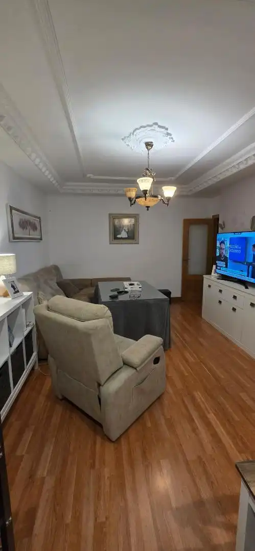 Sala de estar de Piso en venta en Mérida con Parquet, Trastero y Parking comunitario