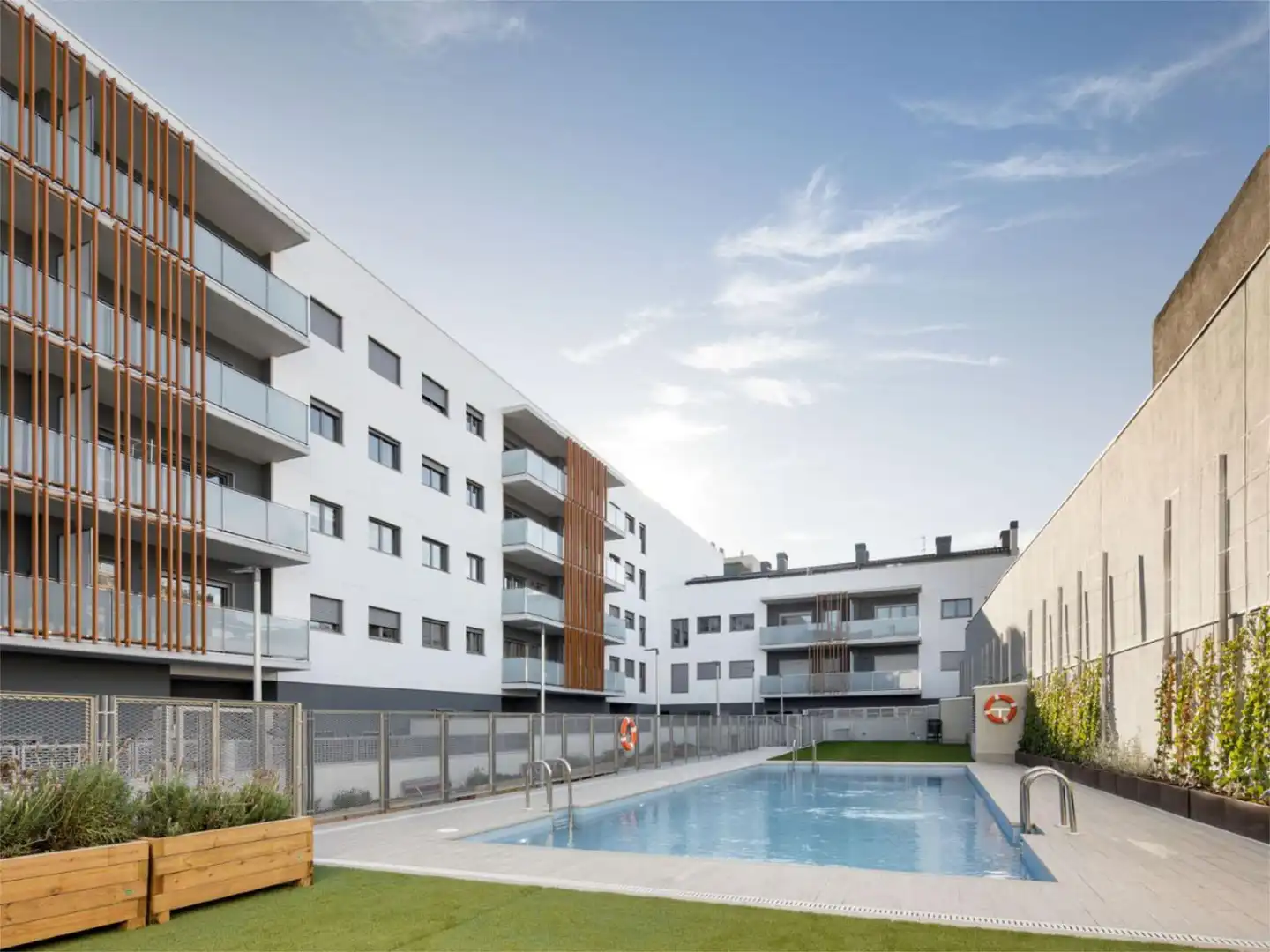 Flat for sale in Eixample Exterior view of Flat for sale in Sabadell with Air Conditioner, Terrace and Swimming Pool