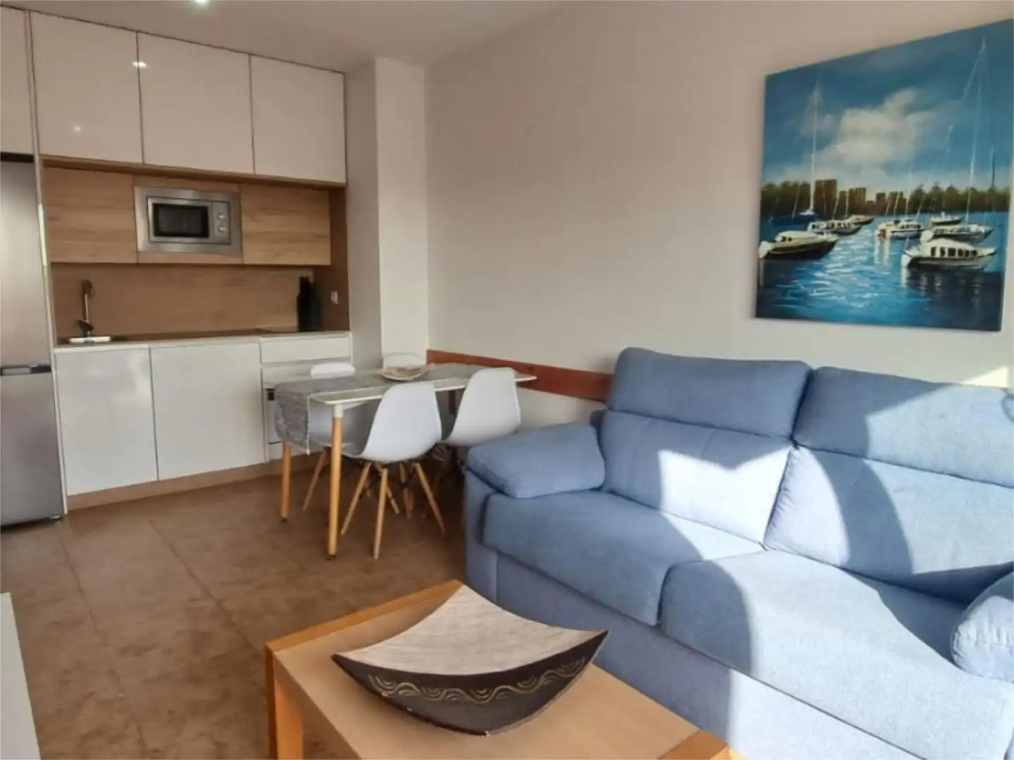 Apartamento de alquiler en Avenida del Decano, 2, Punta Umbría Sala de estar de Apartamento de alquiler en Punta Umbría con Aire acondicionado, Terraza y Piscina