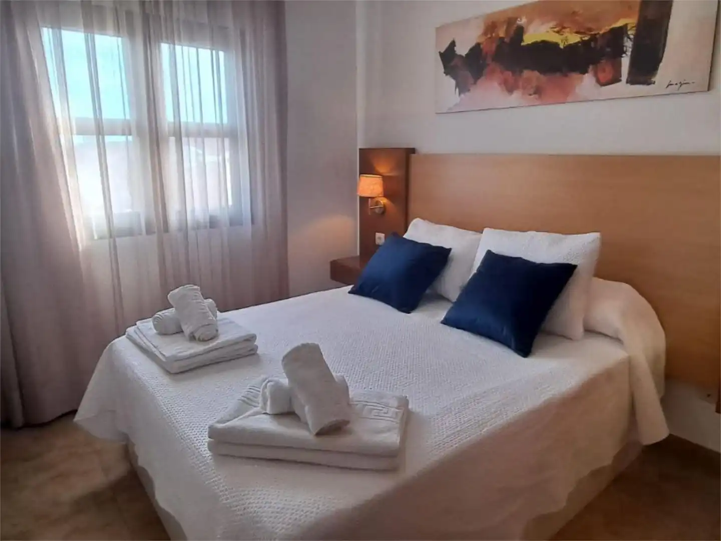 Habitación de Apartamento de alquiler en Punta Umbría con Aire acondicionado, Calefacción y Jardín privado