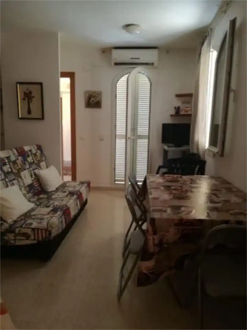 Estudi en venda a Platja de Mont-roig Sala d'estar de Estudi en venda en Mont-roig del Camp amb Piscina