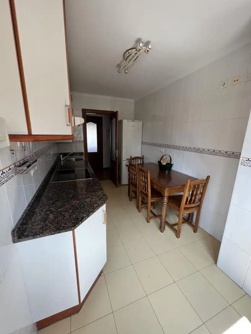 Kitchen of Flat for rent in Gijón   with Heating, Private garden and Parquet flooring