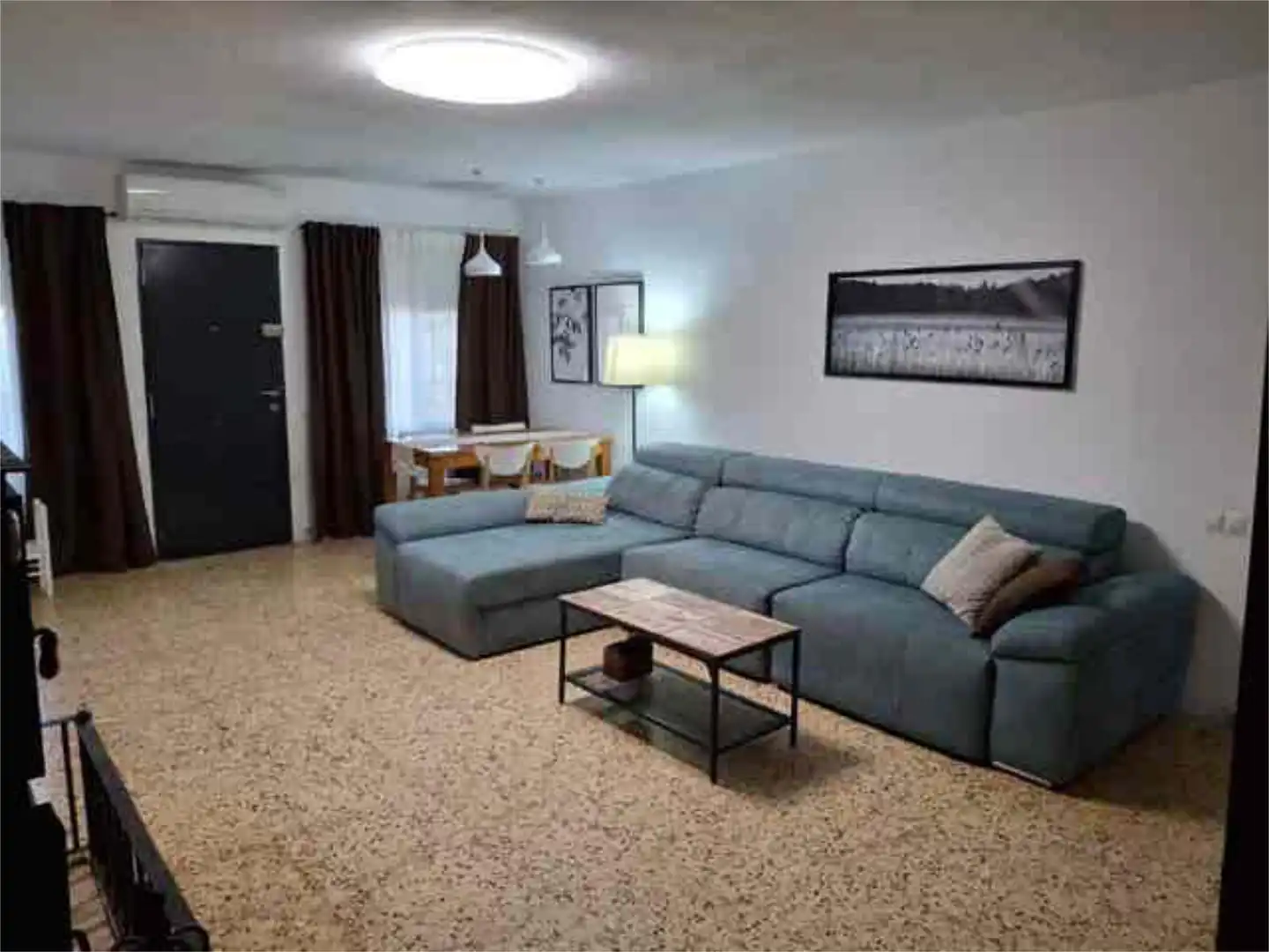 Casa adosada en venda a Monte Real Sala d'estar de Casa adosada en venda en Torrent amb Jardí privat, Terrassa i Piscina