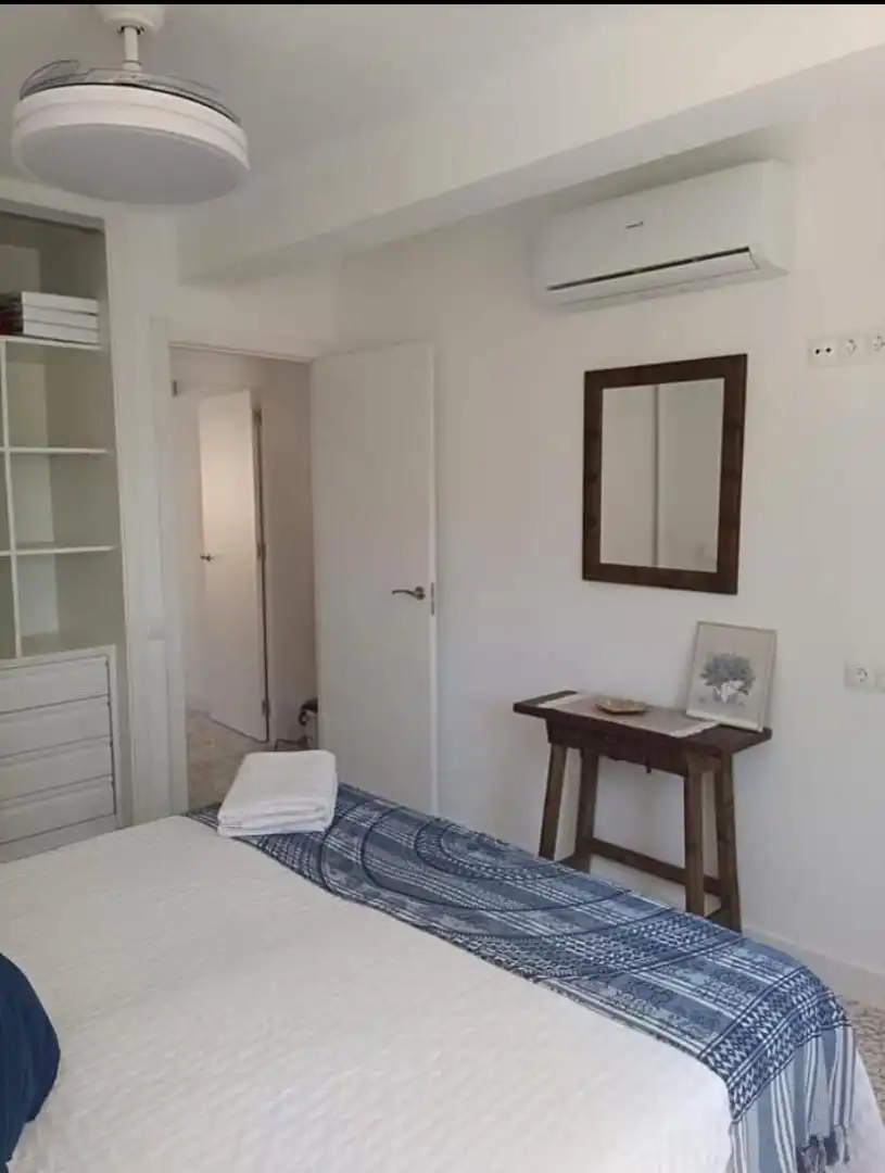 Habitación de Apartamento de alquiler en Vélez-Málaga con Aire acondicionado, Piscina y Amueblado