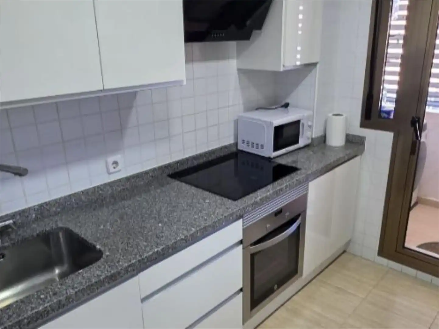 Kitchen of Flat for share in Almería  with Air Conditioner, Heating and Furnished