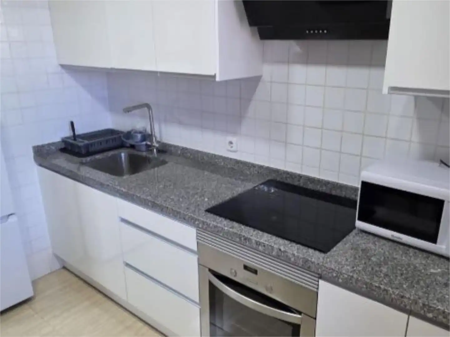 Kitchen of Flat for share in Almería  with Air Conditioner, Heating and Furnished