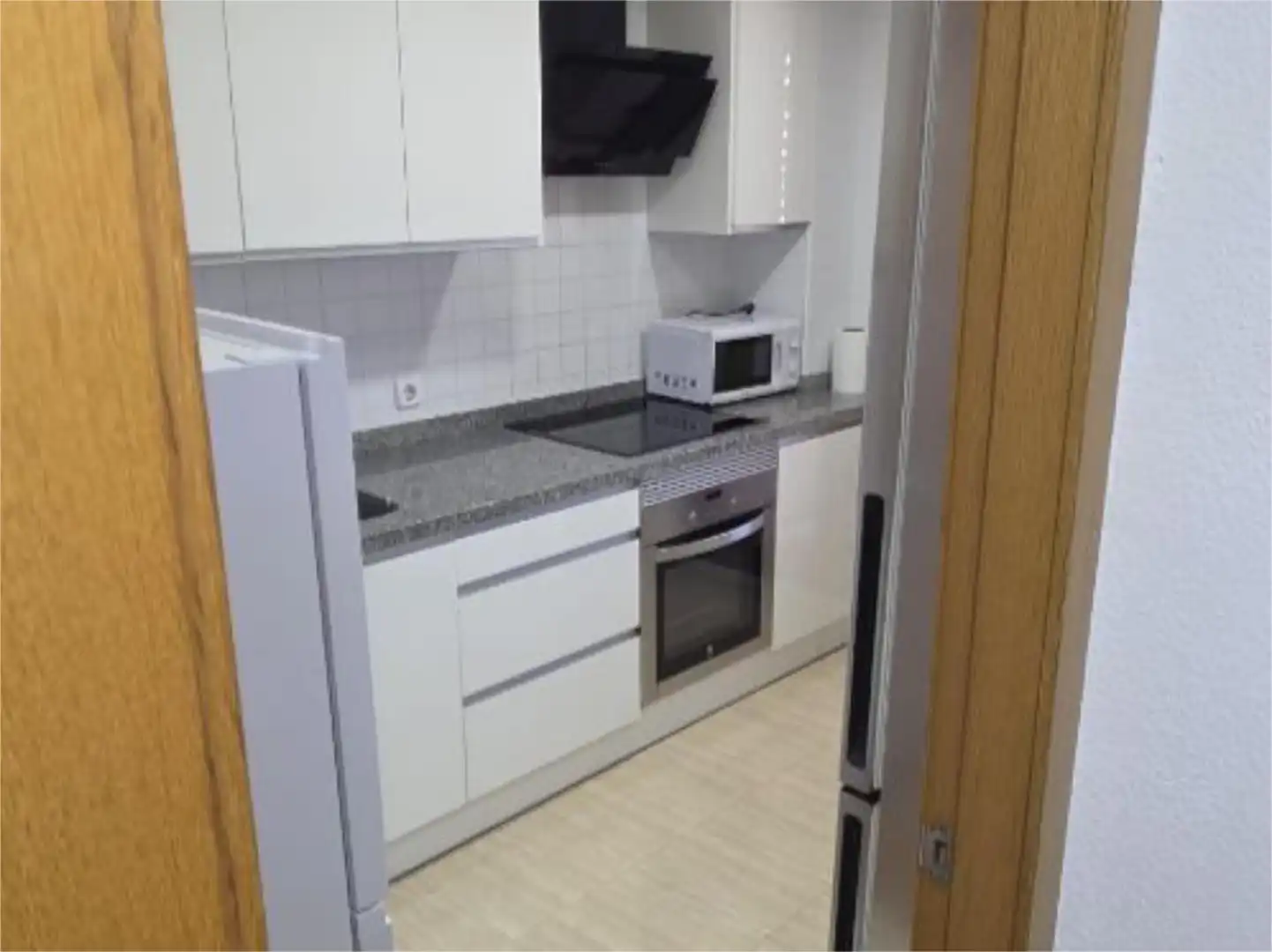 Kitchen of Flat for share in Almería  with Air Conditioner, Heating and Furnished