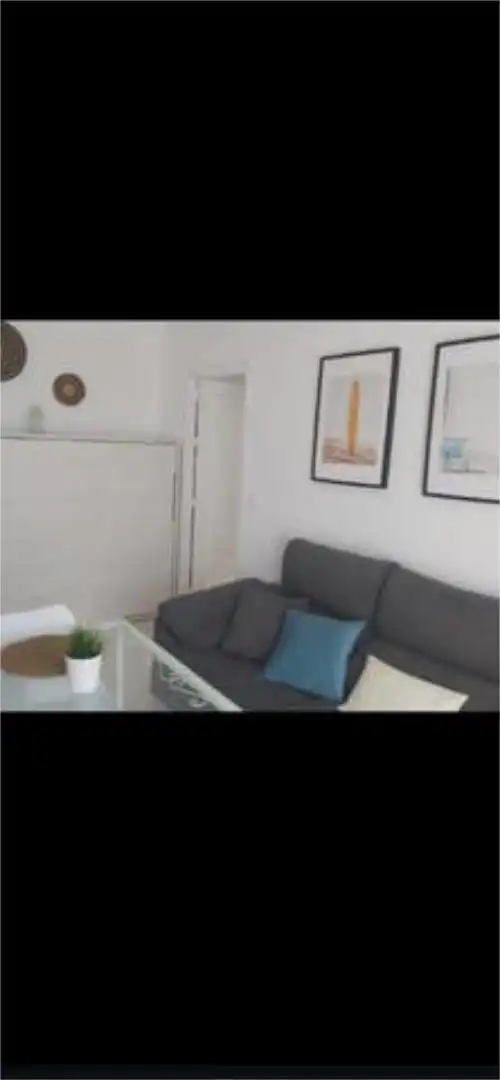 Piso de alquiler en Aguadulce - Almadraba - Punta Candor Sala de estar de Piso de alquiler en Rota con Terraza, Piscina y Amueblado