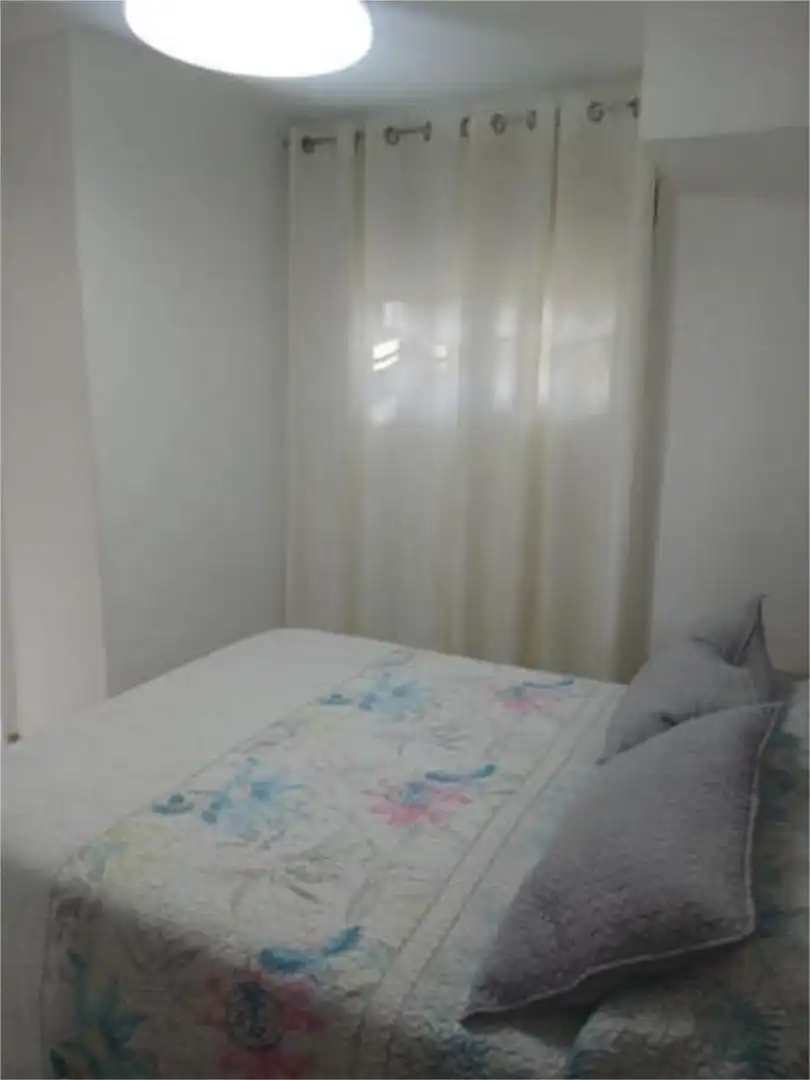 Dormitori de Apartament de lloguer en Almonte amb Jardí privat i Piscina
