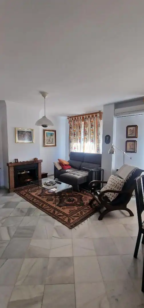 Casa adosada en venda a Calle Magnolios, 4, Peligros Sala d'estar de Casa adosada en venda en Peligros amb Aire condicionat i Piscina